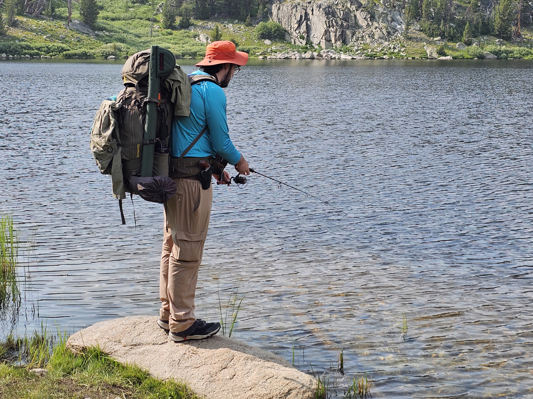 kaden fishing with backpack on