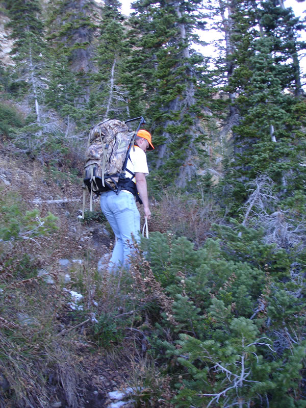 Weston hauling out elk meat with his Cabelas Alaskan frame pack