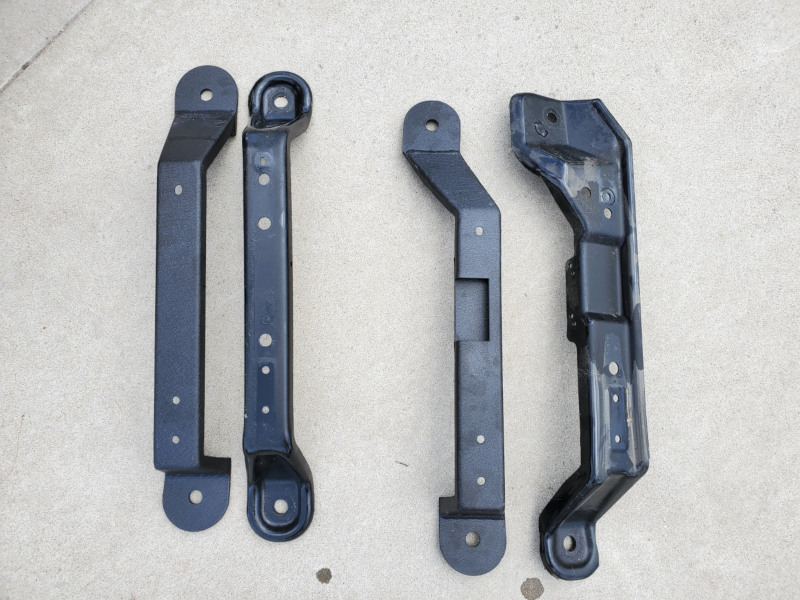 Misch BigBoy JK driver seat bracket and stock brackets.