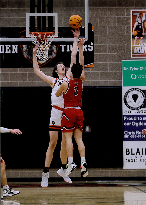 Blocking shot with left hand.