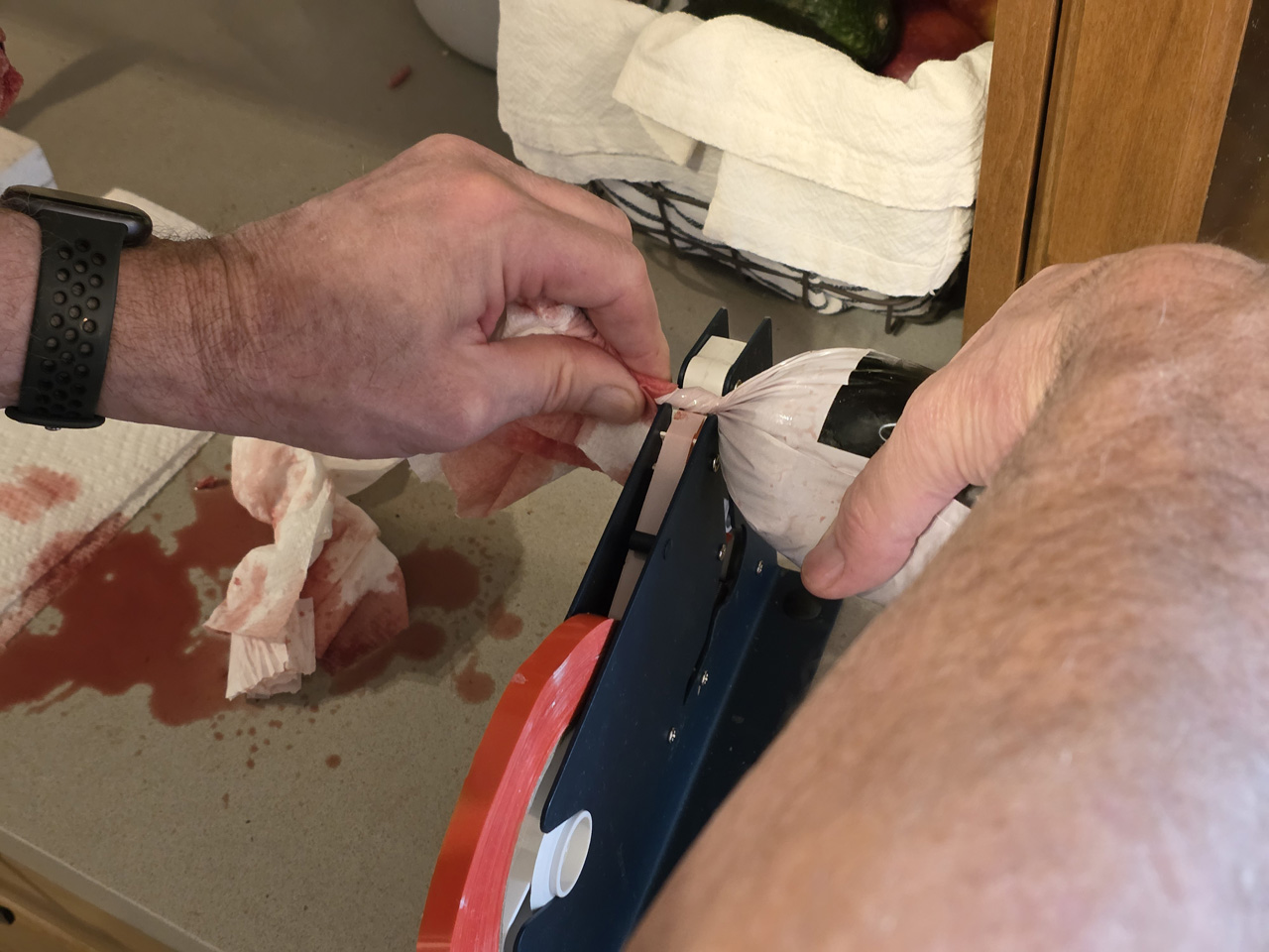 Taping burger bags shut